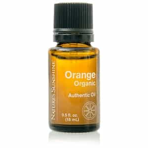 Nature’s Sunshine organic orange essential oil bottle with pure citrus aroma
