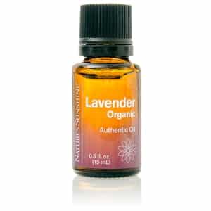 Organic Lavender Essential Oil bottle with fresh lavender sprigs, emphasizing natural calm, restful sleep, and soothing skin support.