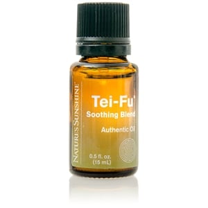 Tei‑Fu Soothing Essential Oil Blend bottle with fresh botanicals, illustrating authentic cooling relief benefits.
